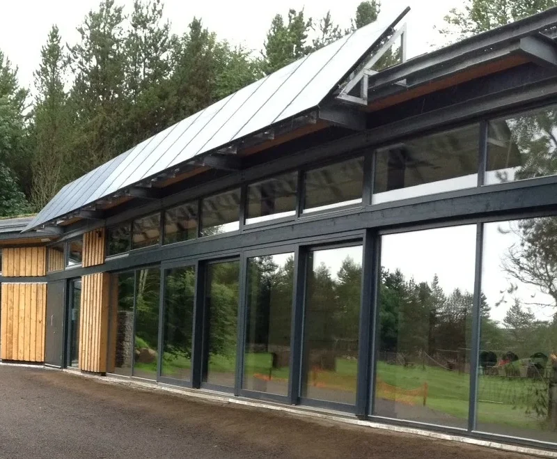 Solar panels on the side of a modern building