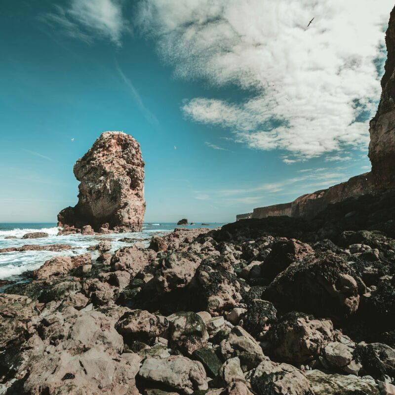 South Shields coastal rocks with blue sky